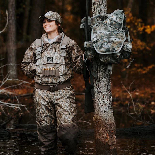 http://www.gatorwaders.com/cdn/shop/collections/Gator-Waders-Shield-Insulated-Waders-Womens-Mossy-Oak-Bottomland-In-Action-3.webp?v=1698167361