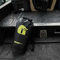 Load image into Gallery viewer, Lime Bounty Bag sitting in truck bed