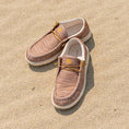 Load image into Gallery viewer, A pair of Camp Shoes sitting in the sand on the beach.